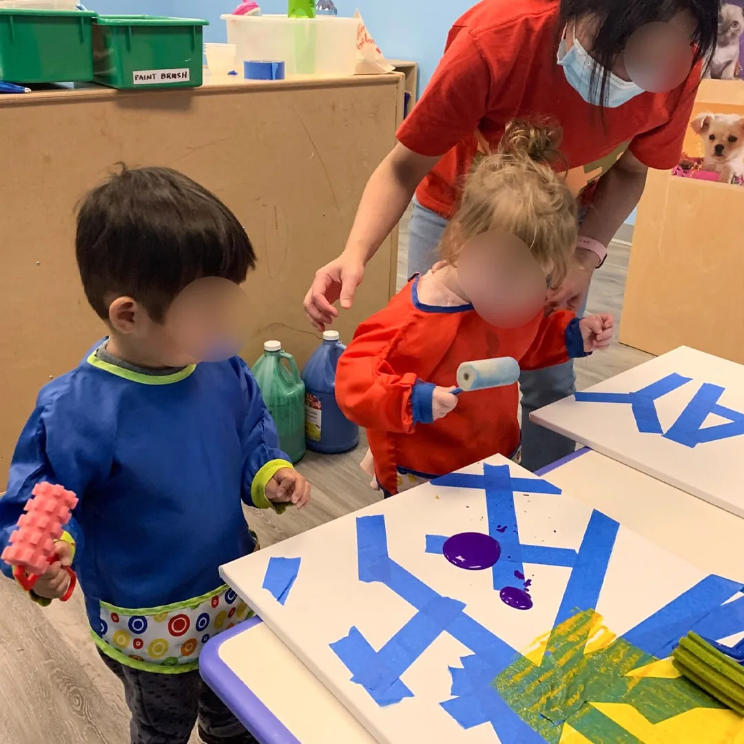 Village Scholars Preschool photo: tape-resist painting with bright colours