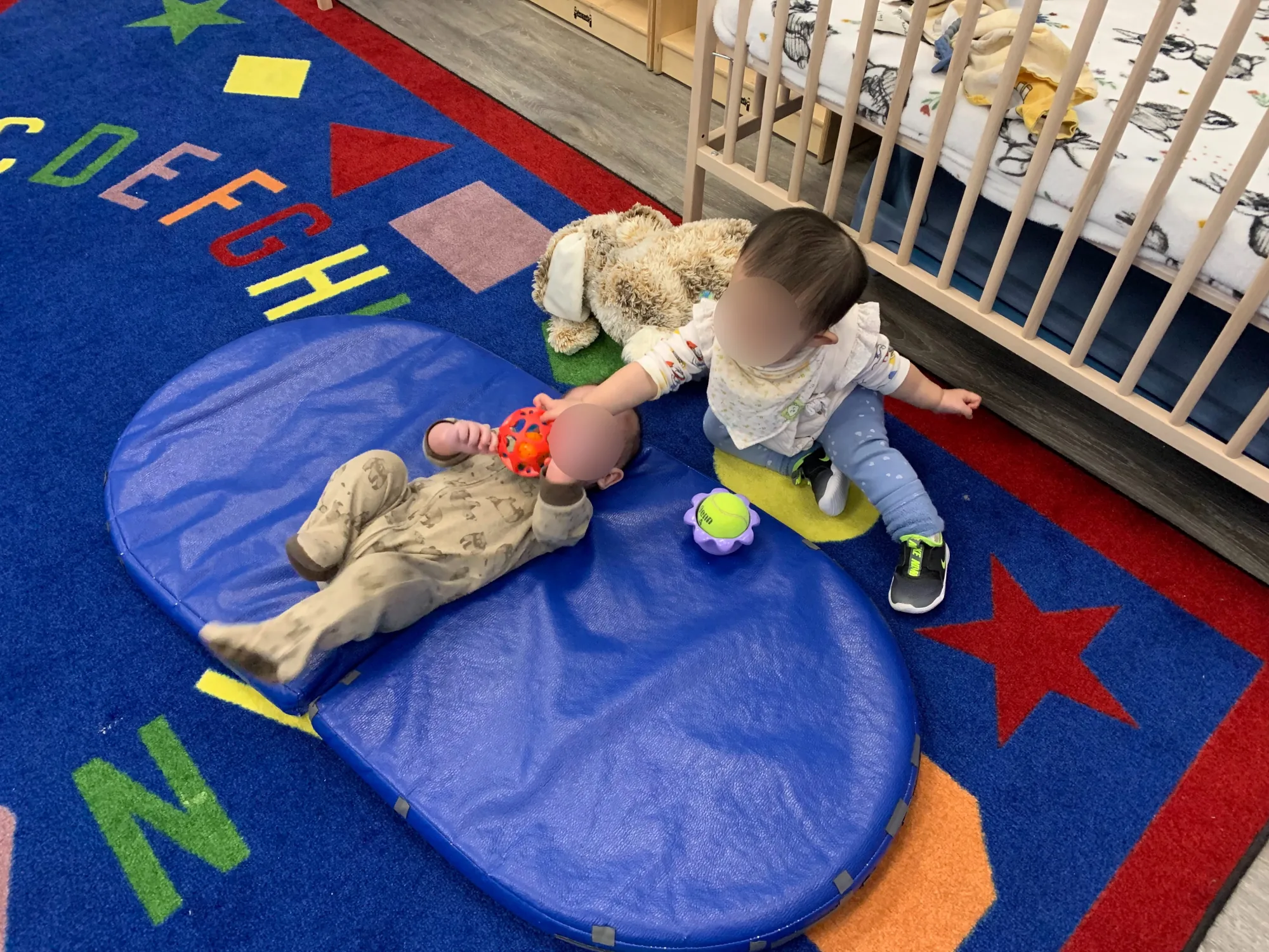 Children using pretend food in the Village Scholars Preschool dramatic play area