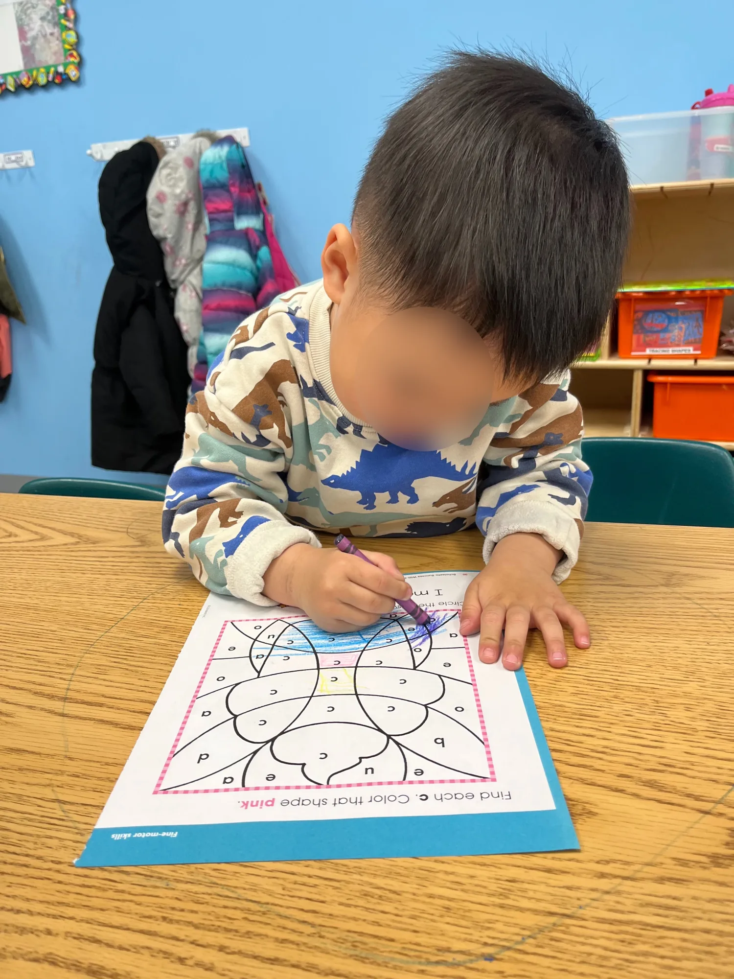 Village Scholars Preschool photo: quiet table work and fine-motor focus