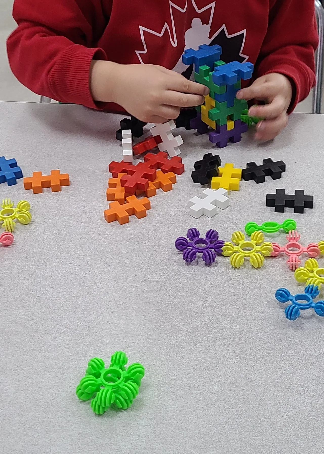 Village Scholars Preschool photo: building patterns with colourful pieces