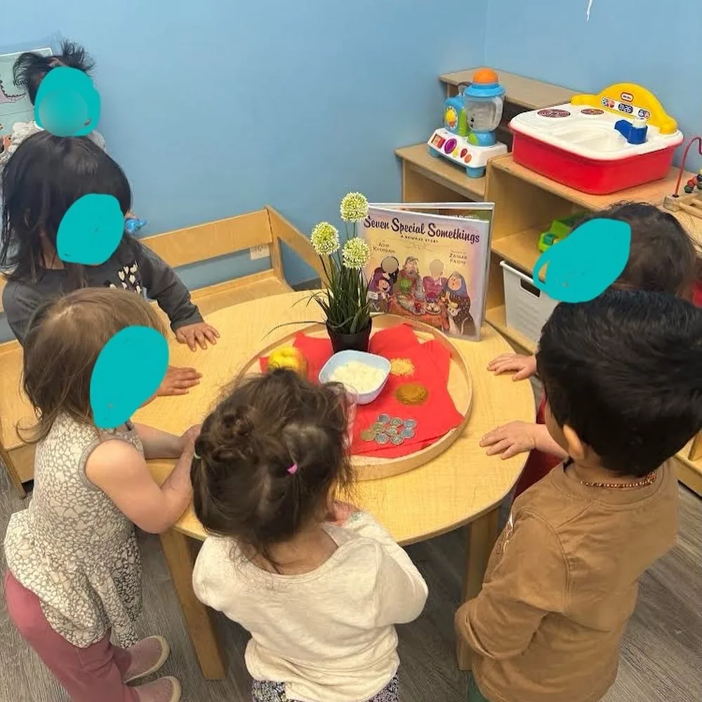 Village Scholars Preschool photo: small-group classroom celebration