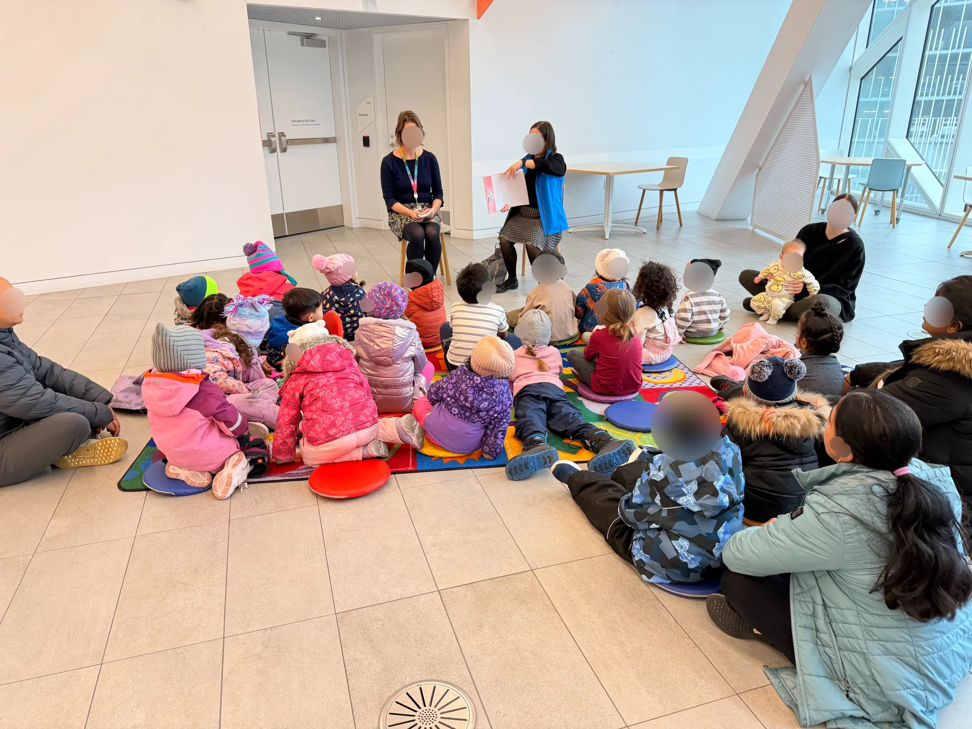 Village Scholars Preschool photo: listening together during a walk
