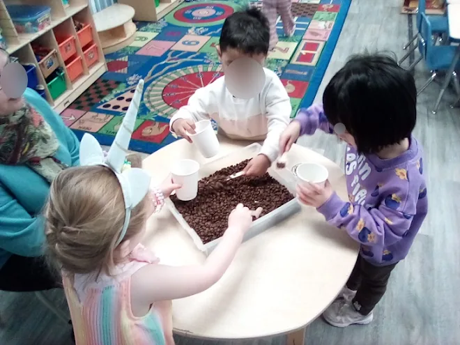 Village Scholars Preschool photo: soil and scoops for hands-on discovery
